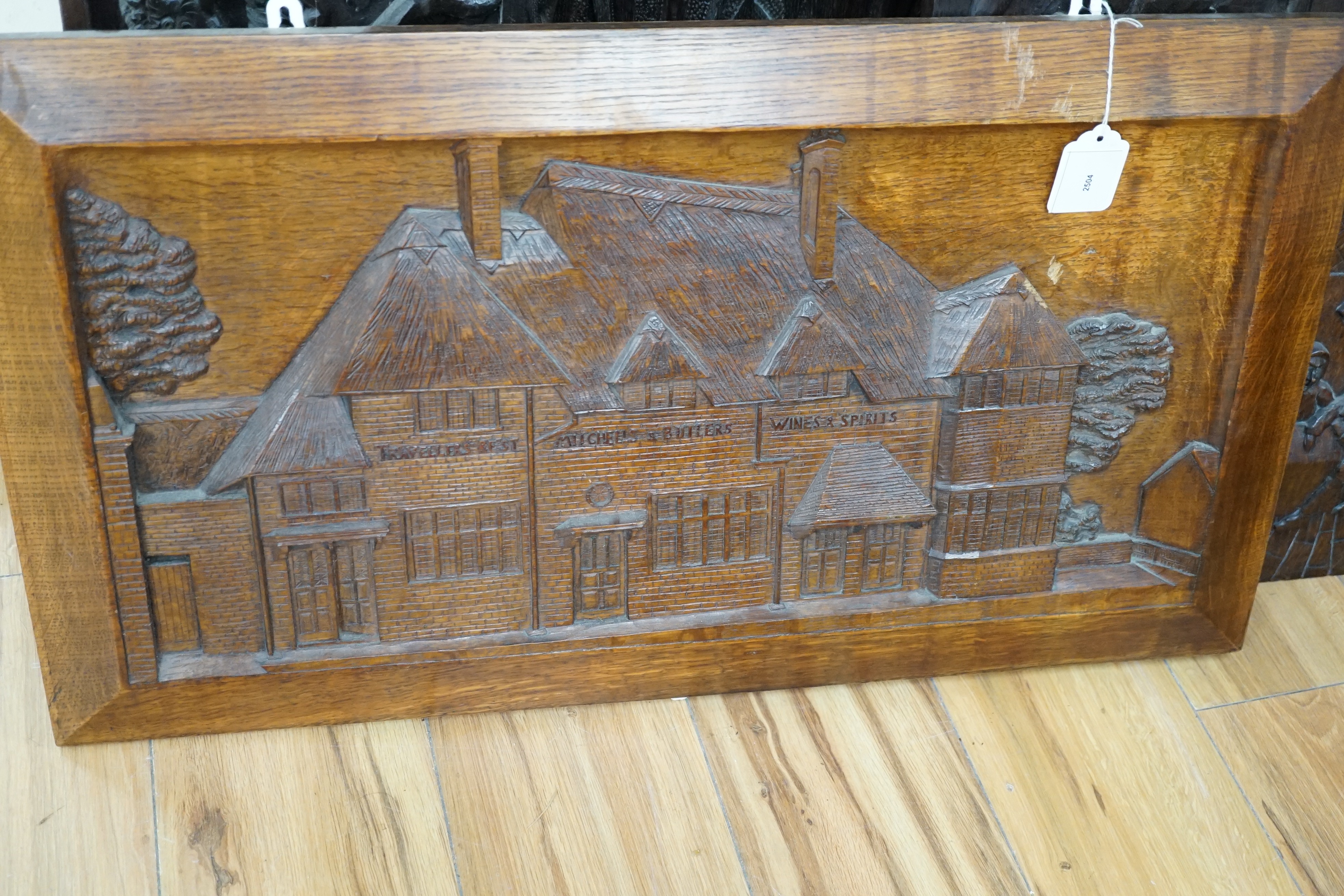 Seven assorted carved wooden panels, widest 166 cms
